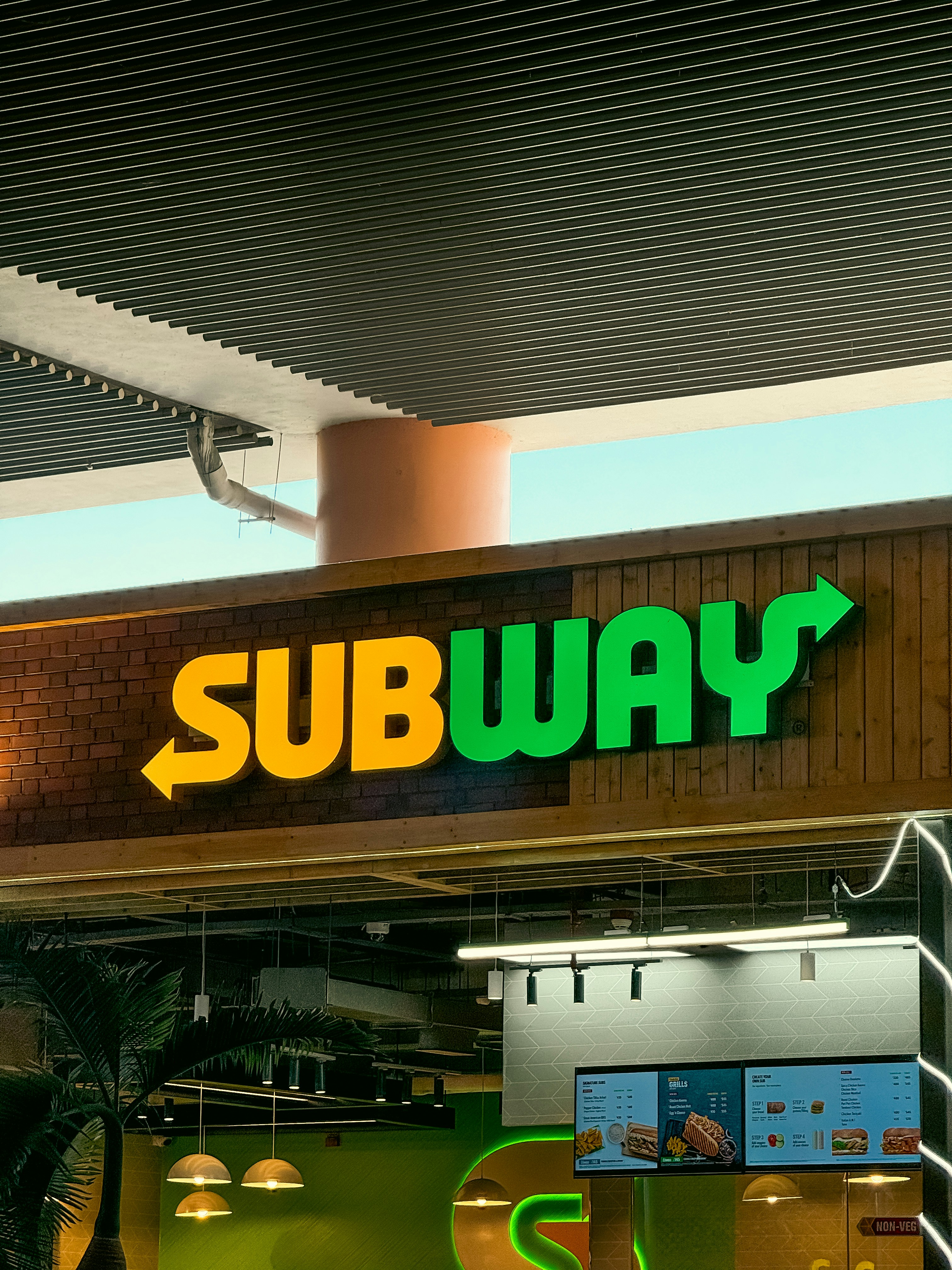 Subway sandwich with fresh vegetables and toasted meat